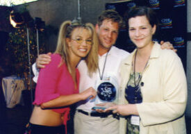 Eric Schwartzman awarding the Silicon CD to Britney Spears for most played artist on the net, with Ann Greenberg of Gracenote.