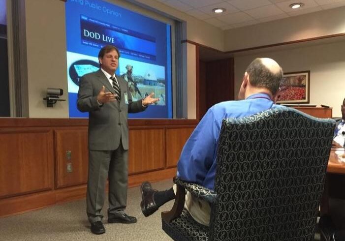 Digital marketing consultant Eric Schwartzman presenting a digital marketing strategy to the Defense Commissary Agency executive team at Fort Lee, Virginia.